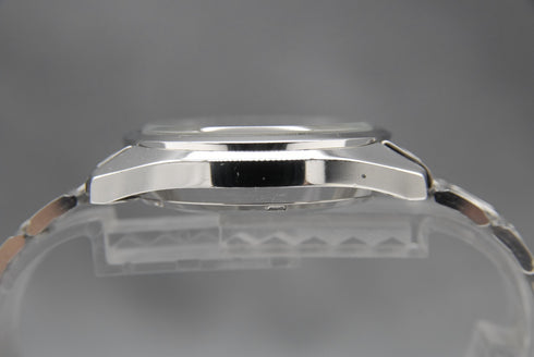 7551956
